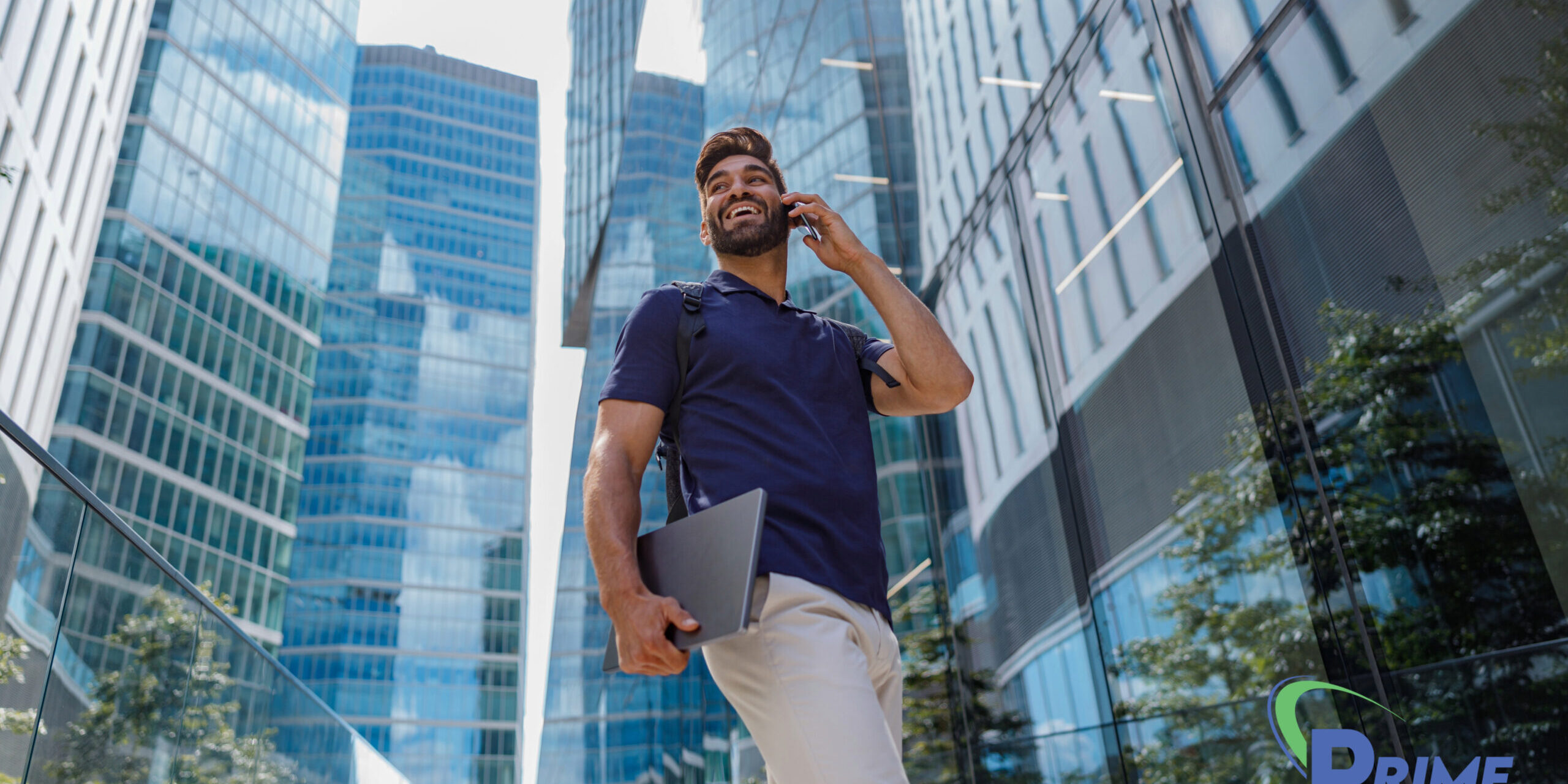 A busy home owners association executive walks through an apartment complex. HOAs are one of many businesses that should utilize the benefits of virtual assistants.