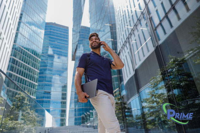 A busy home owners association executive walks through an apartment complex. HOAs are one of many businesses that should utilize the benefits of virtual assistants.